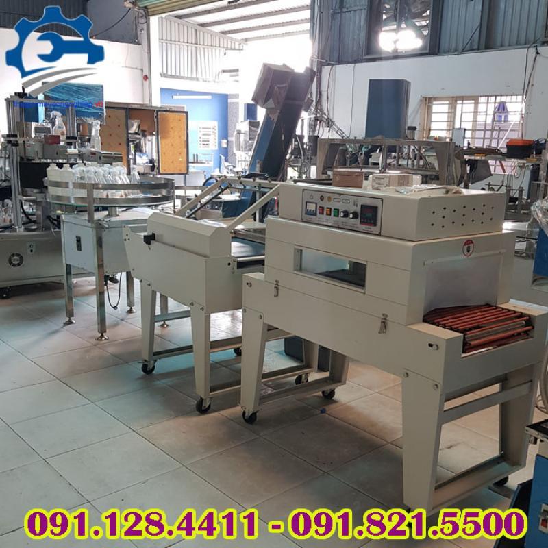 Máy co màng chai nước, lốc chai, máy rút màng co chai mỹ phẩm